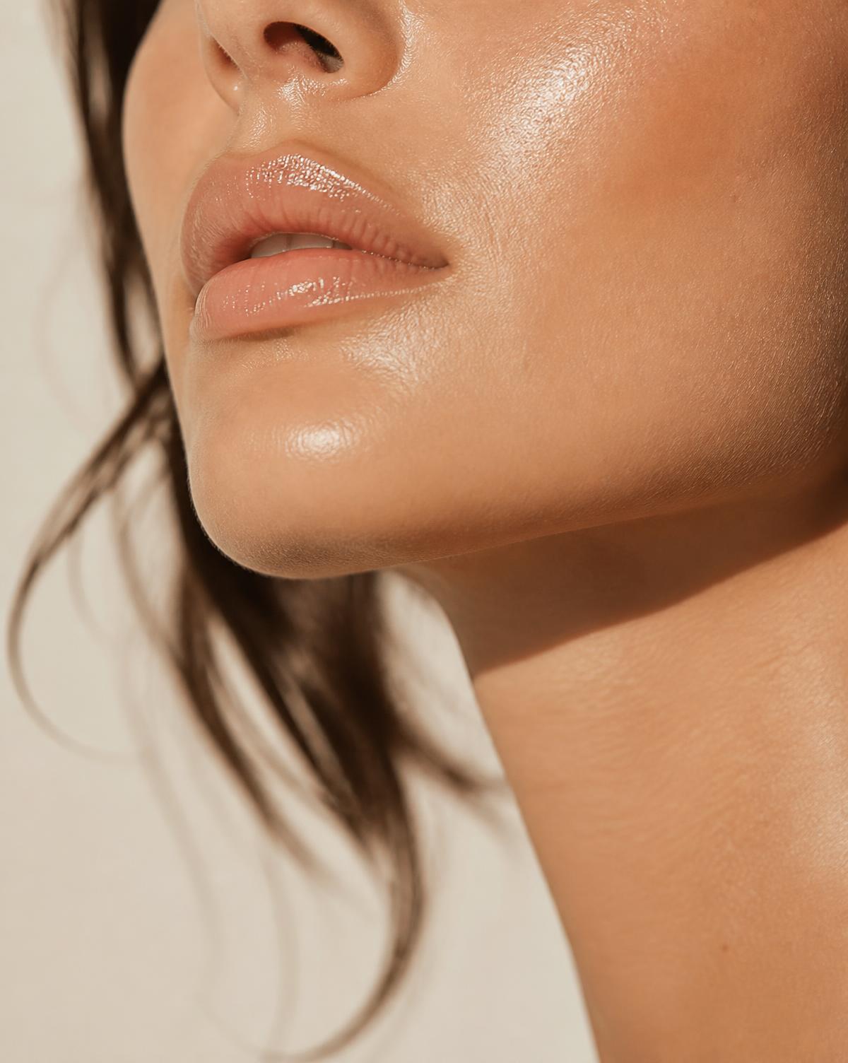 Close detail of refined, luminous skin after treatment